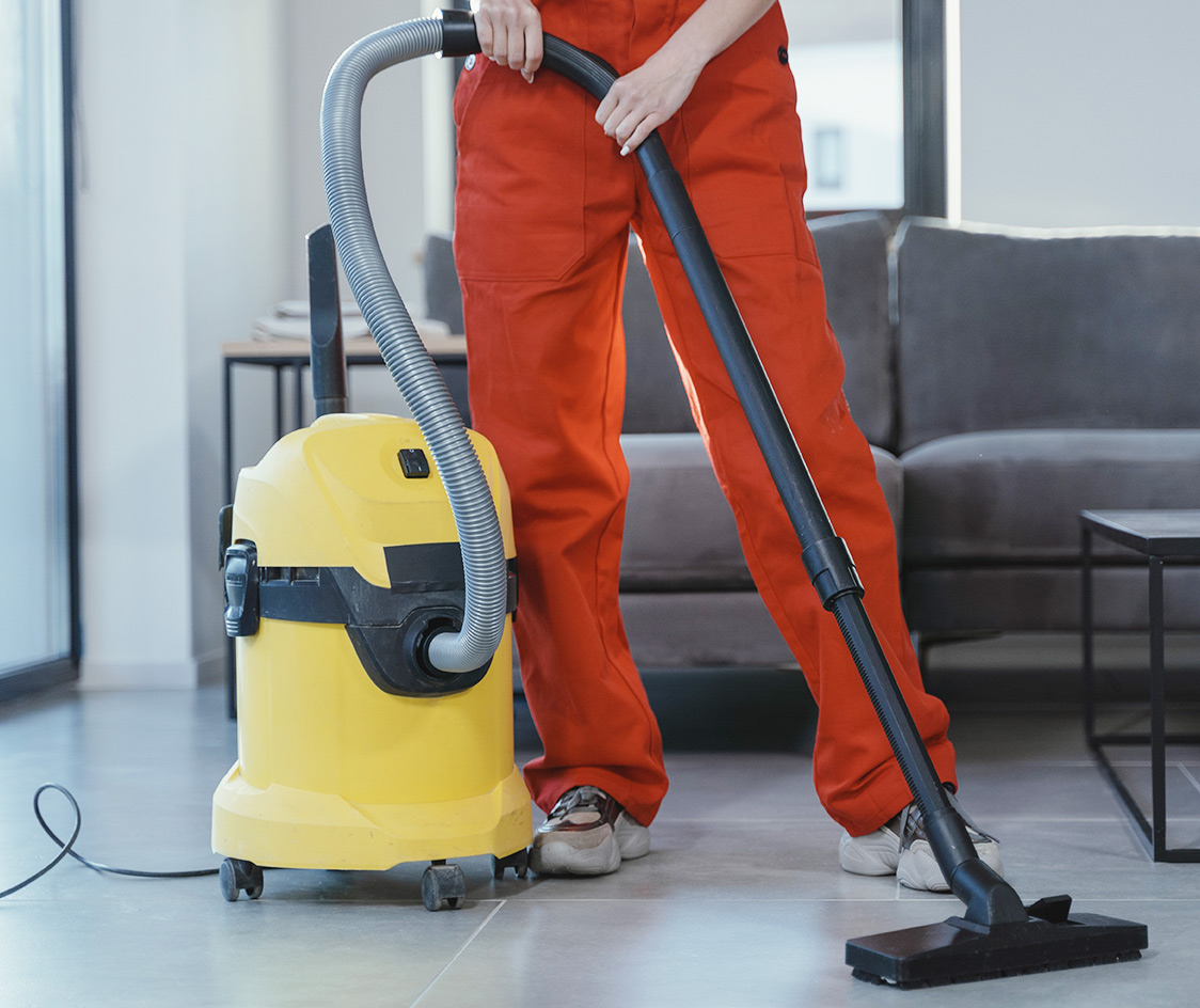 person cleaning floors